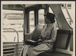 Black and white photo of Rosa Parks on a bus