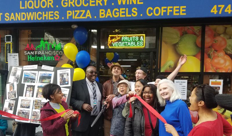 people in front of corner store