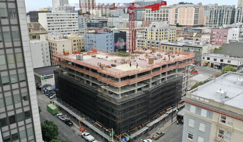 aerial view of 555 Larkin, a multi-storied building under construction