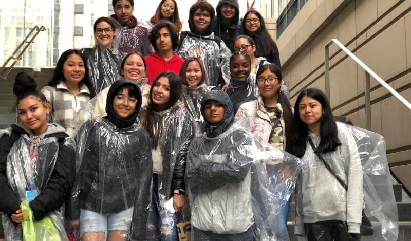 A multi-racial group of teens pose in Chicago