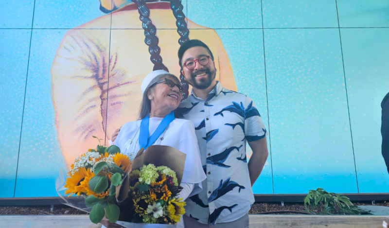  Lorraine Garcia-Nakata and her son, Kanichi, during mural unveiling at Casa Adelante. 