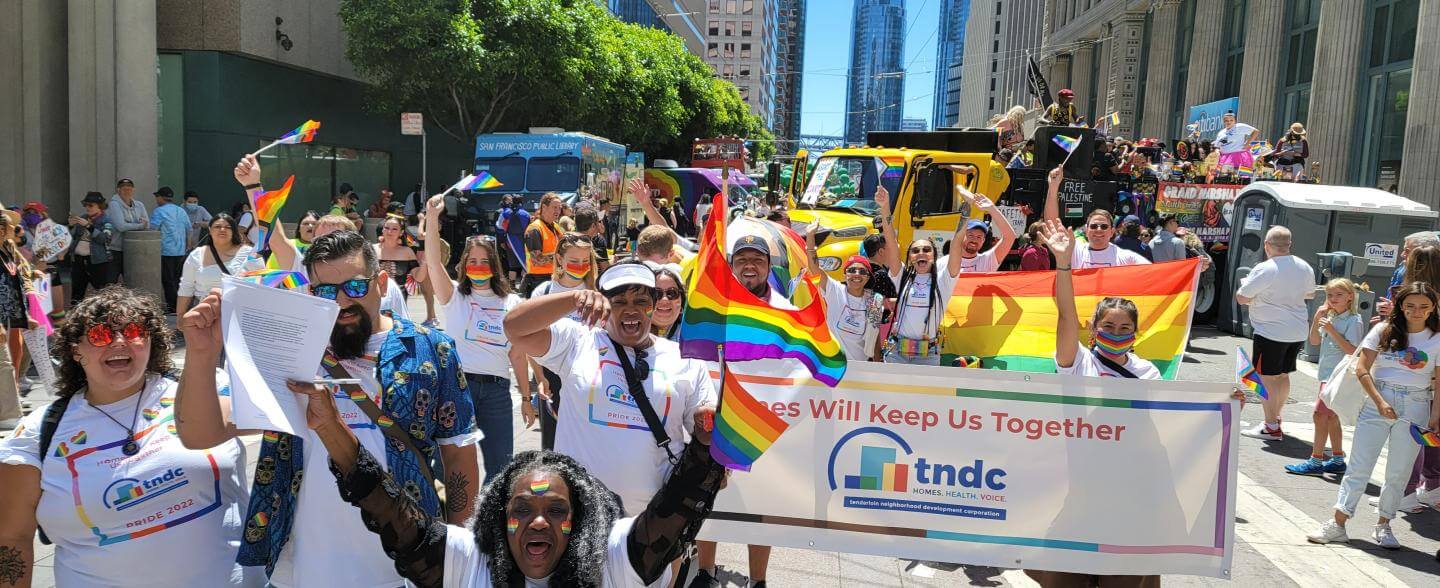 diverse group cheers at SF Pride