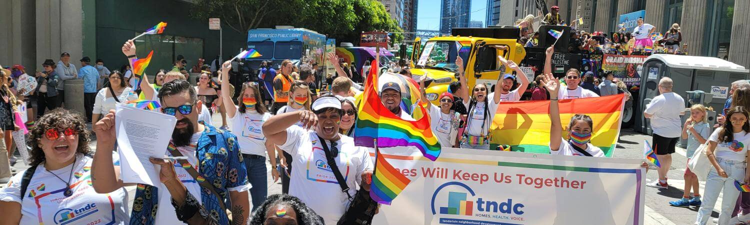 diverse group cheers at SF Pride