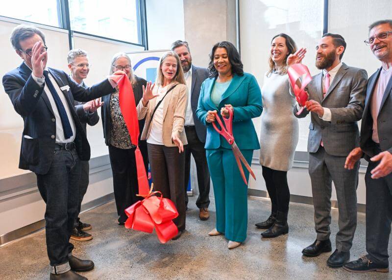180 Jones ribbon cut