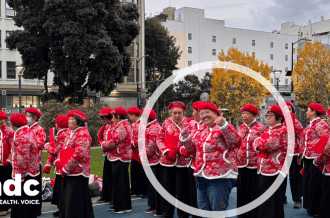 Siu leading the Chinese Rights Assoc Choir